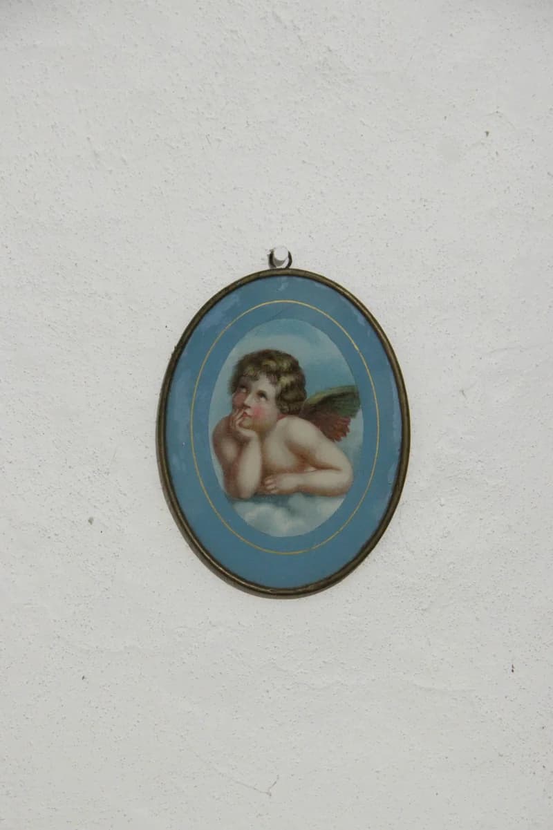 Oval holy picture: Putto